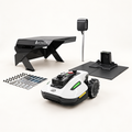 Mammotion YUKA mini 2 1000 + Garage, Power Box e Piattaforma – Bundle Completo — componenti del bundle su fondo chiaro
